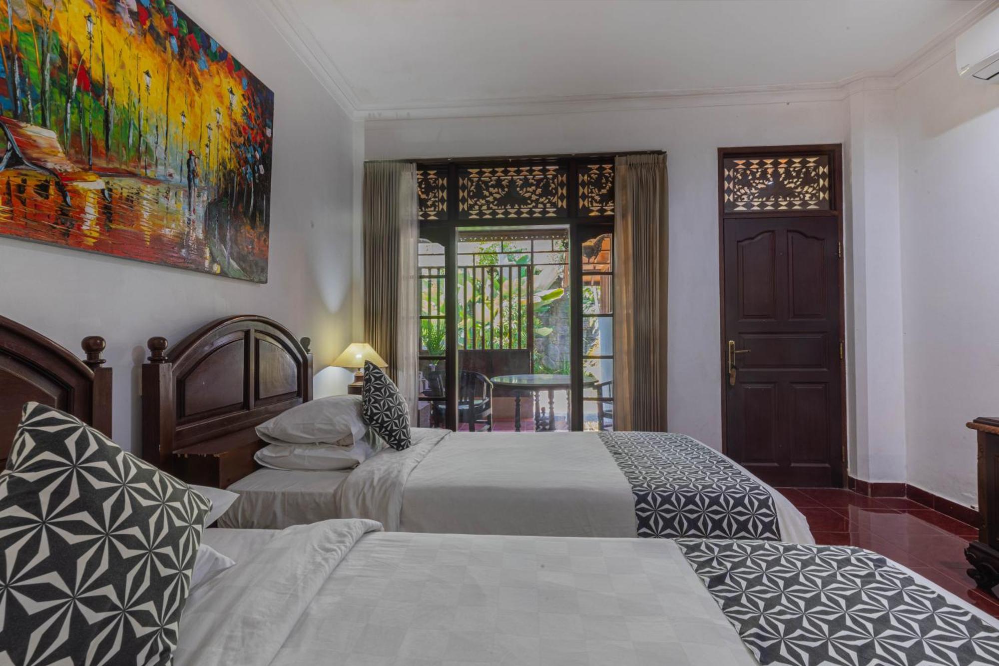 Puri Mango Guest House Sanur Екстериор снимка